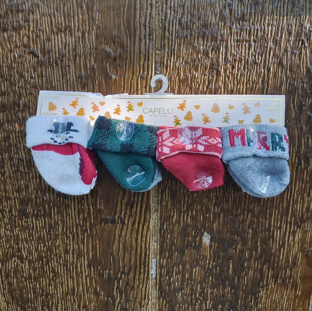 4-pack of infant socks by Capelli New York. 